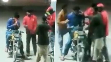 Viral Video: Man Thrashed by Petrol Pump Employee For Smoking Cigarette At Gas Station